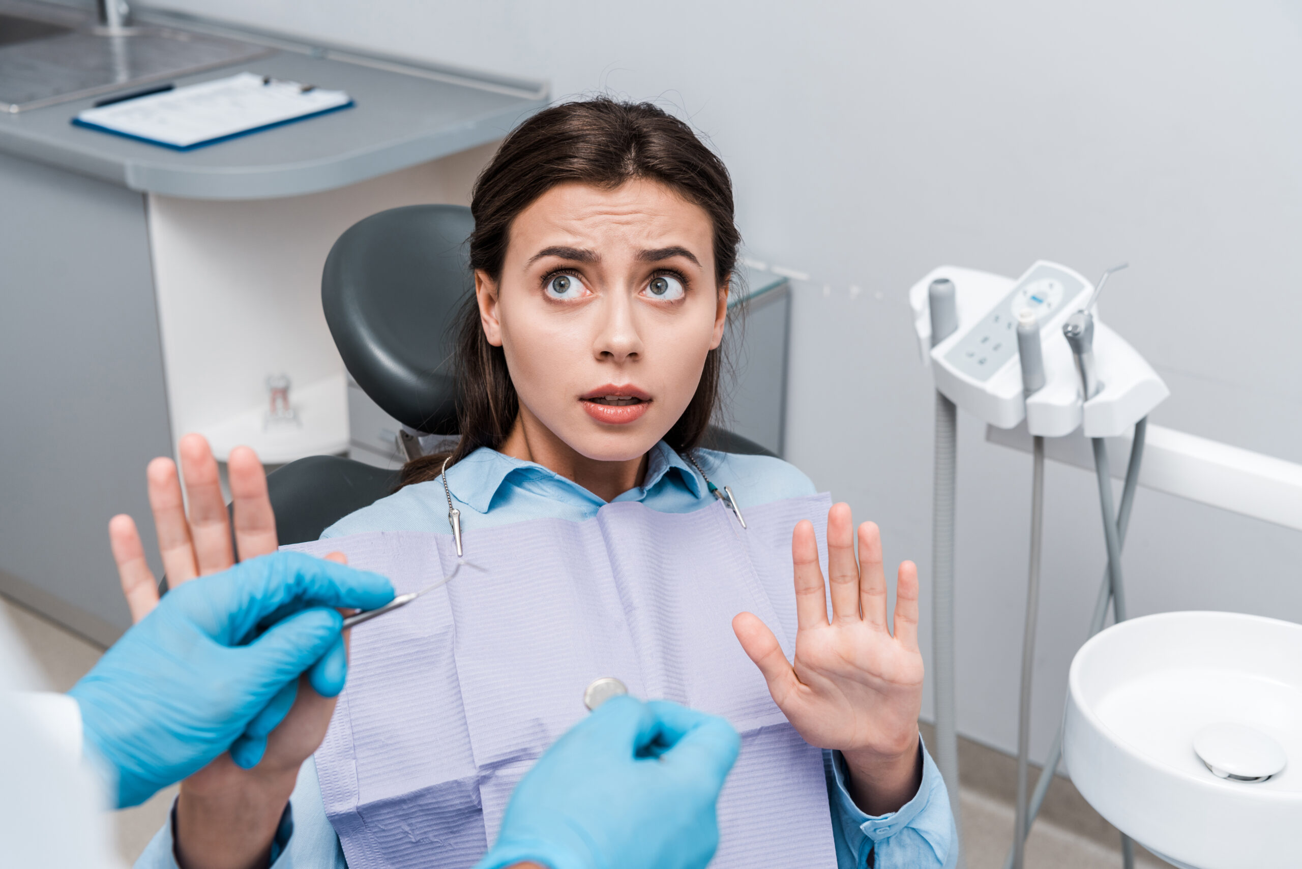 a patient wondering, “is it necessary to go to the dentist?”