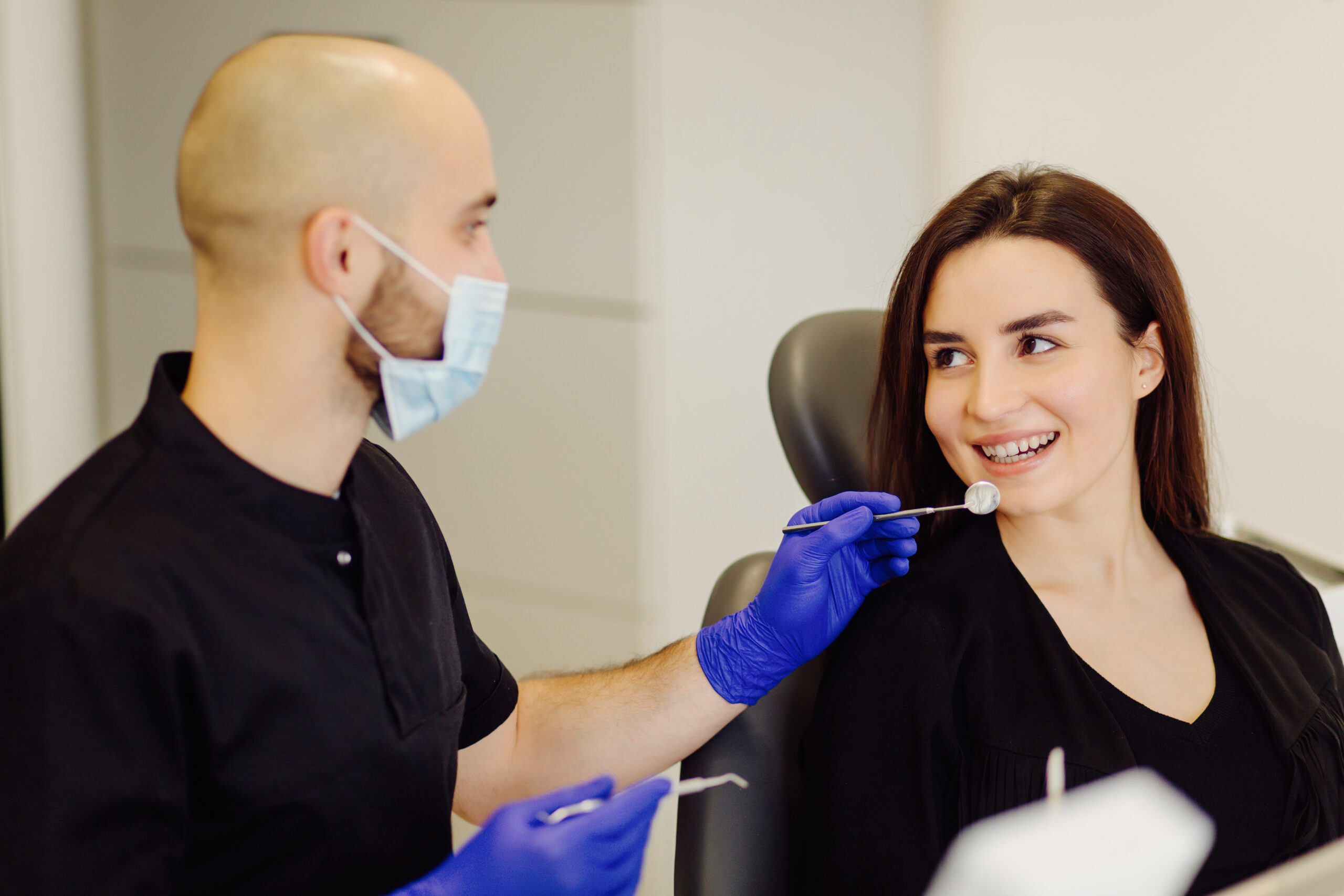 A woman visiting a teeth whitening dentist