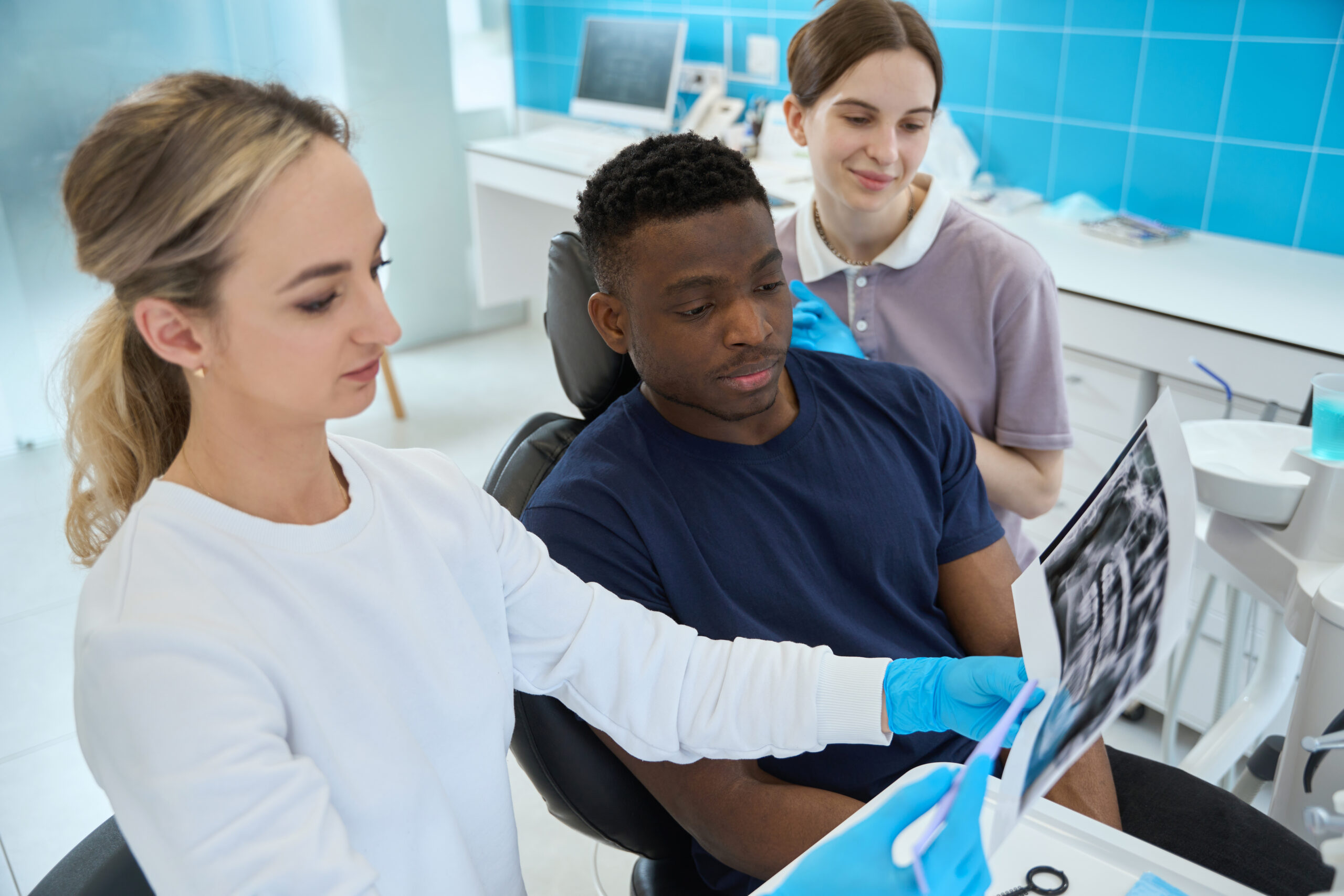 A patient wondering, "how much does it cost to get a crown on a tooth?"
