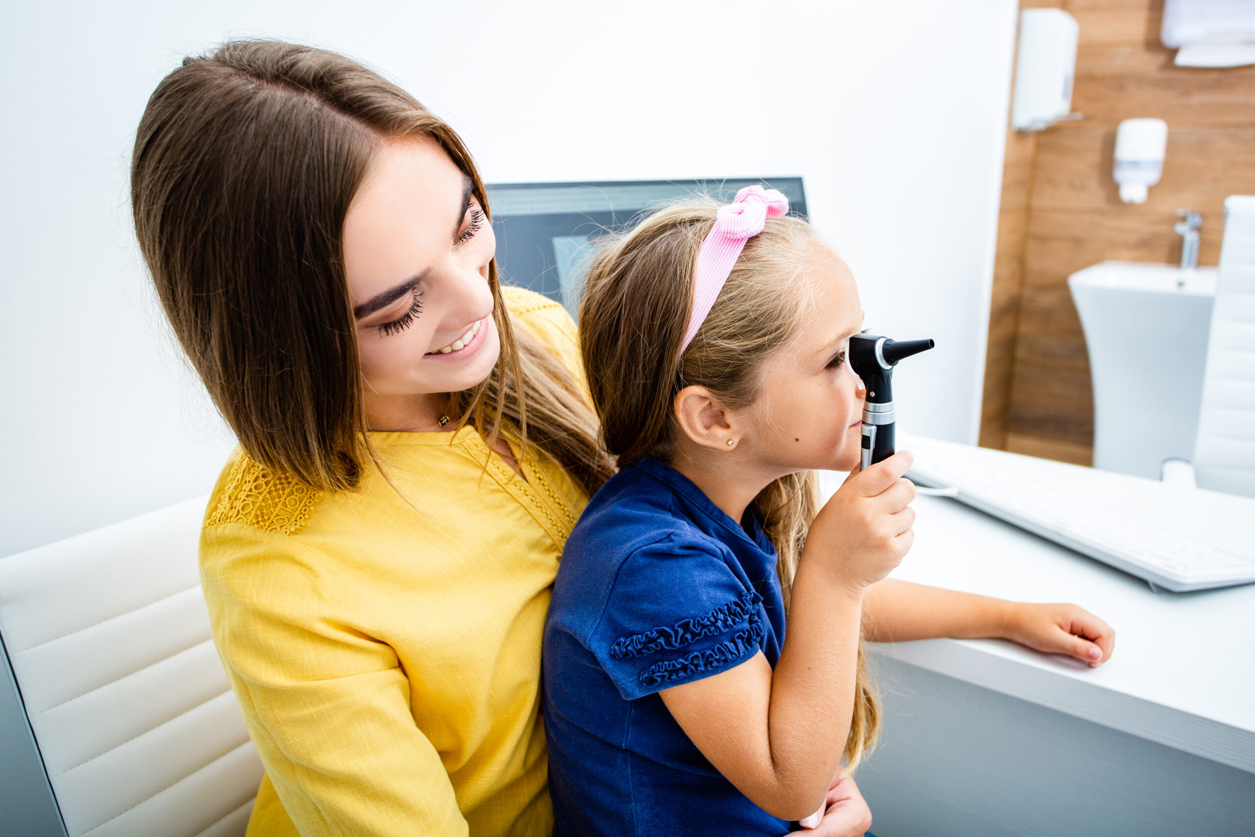 A mother happy with her children's eye exam cost.