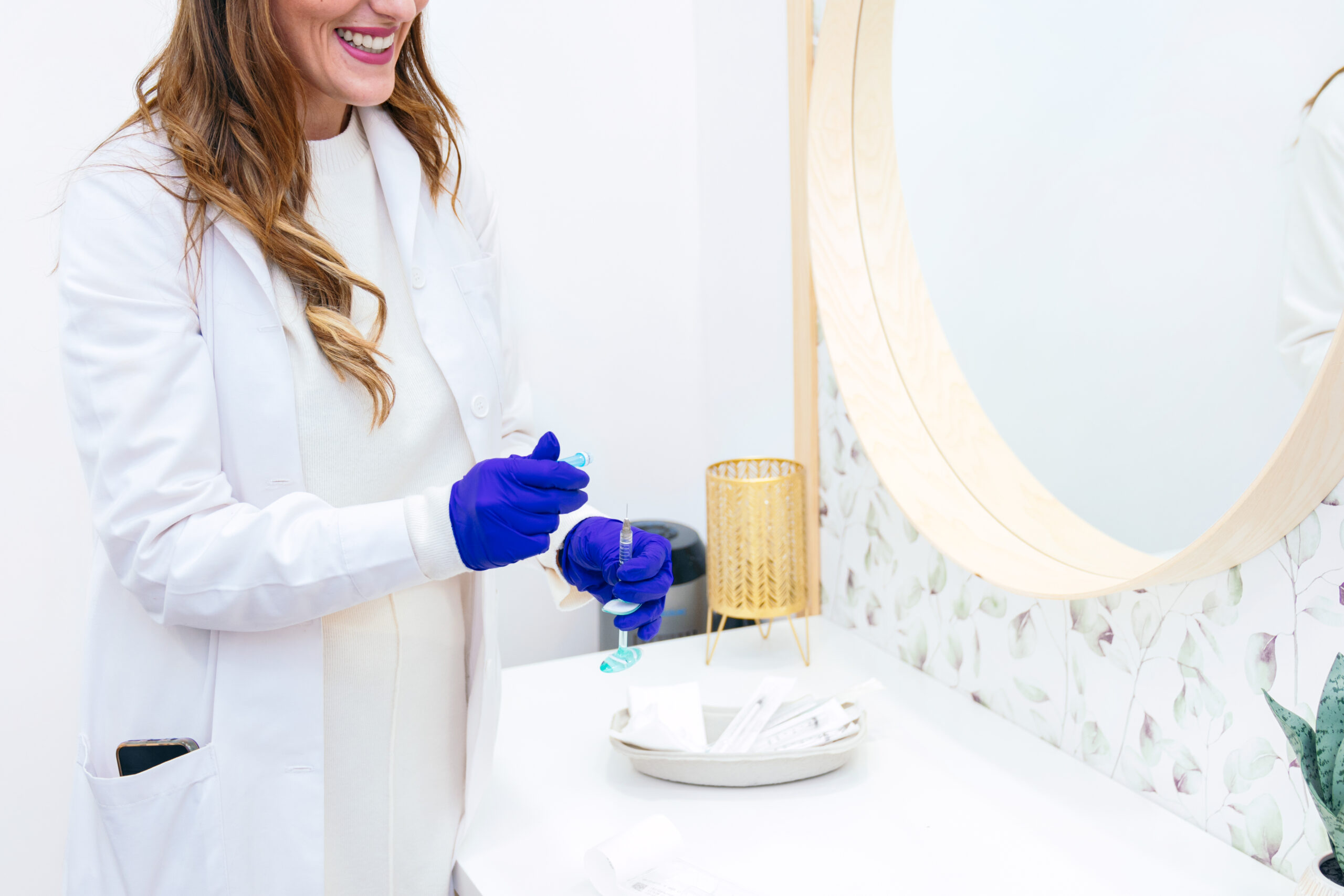 A woman showing how to whiten teeth naturally.