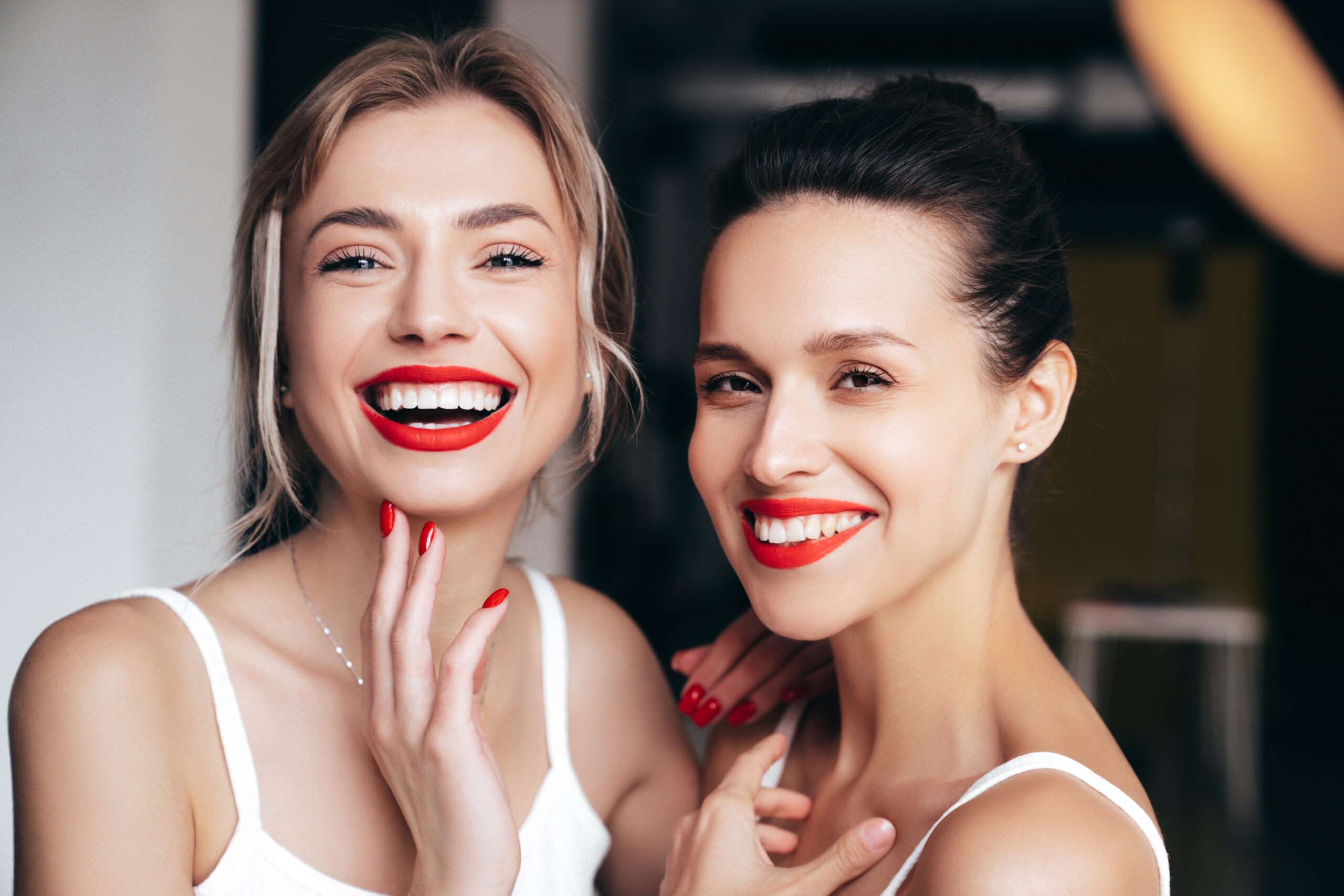 Women happy to learn how to whiten teeth with lemon.