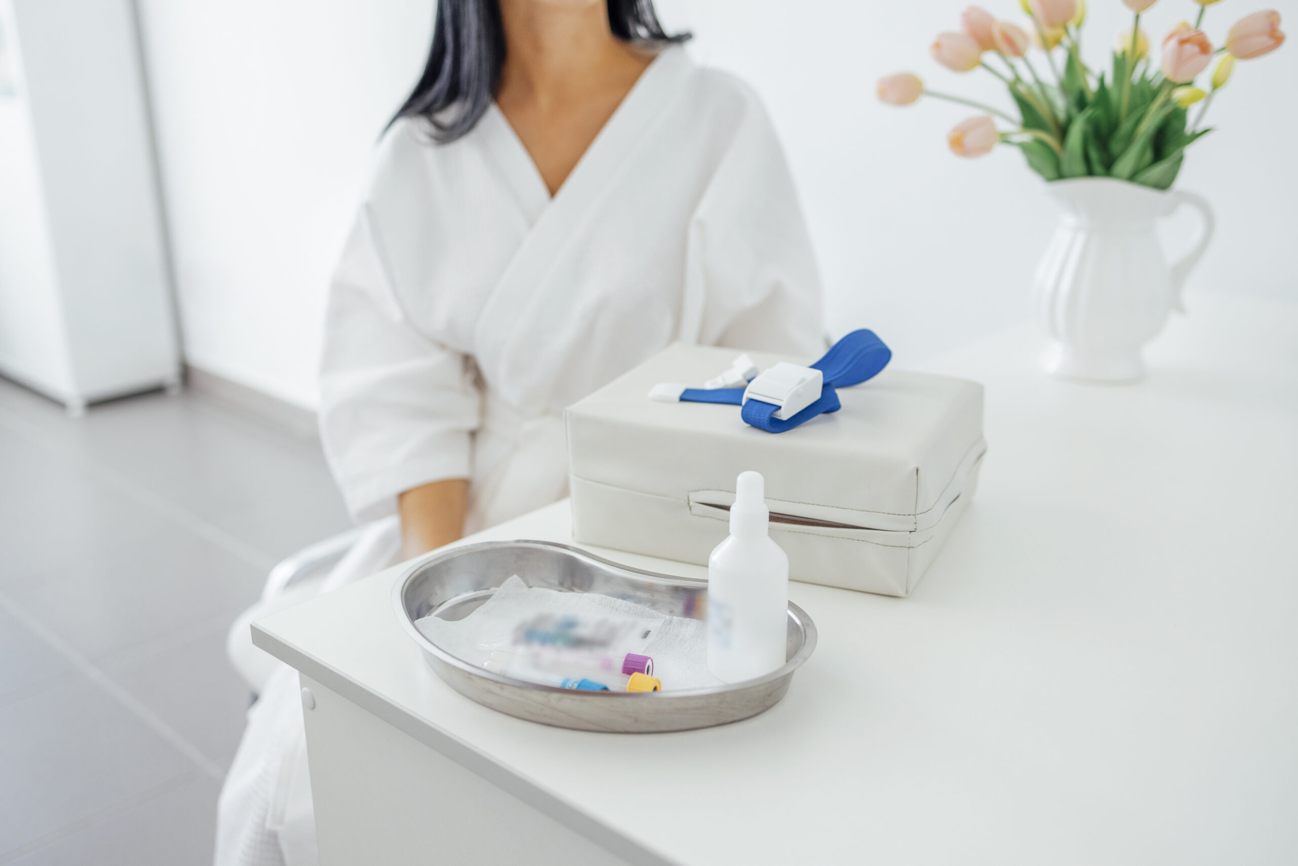 A woman learning to bleach teeth at home.