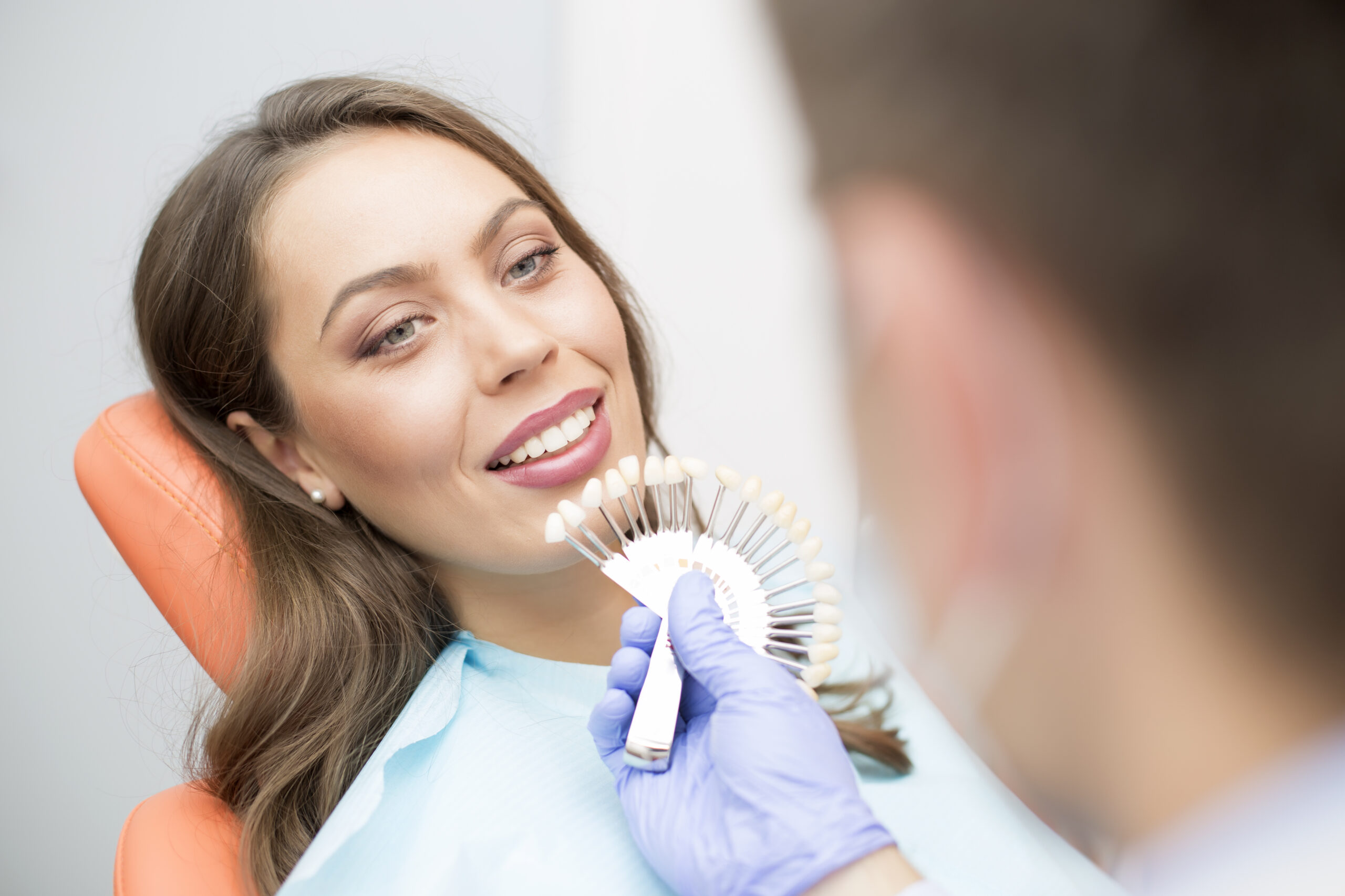 A woman receiving teeth whitening in Arlington, TX.