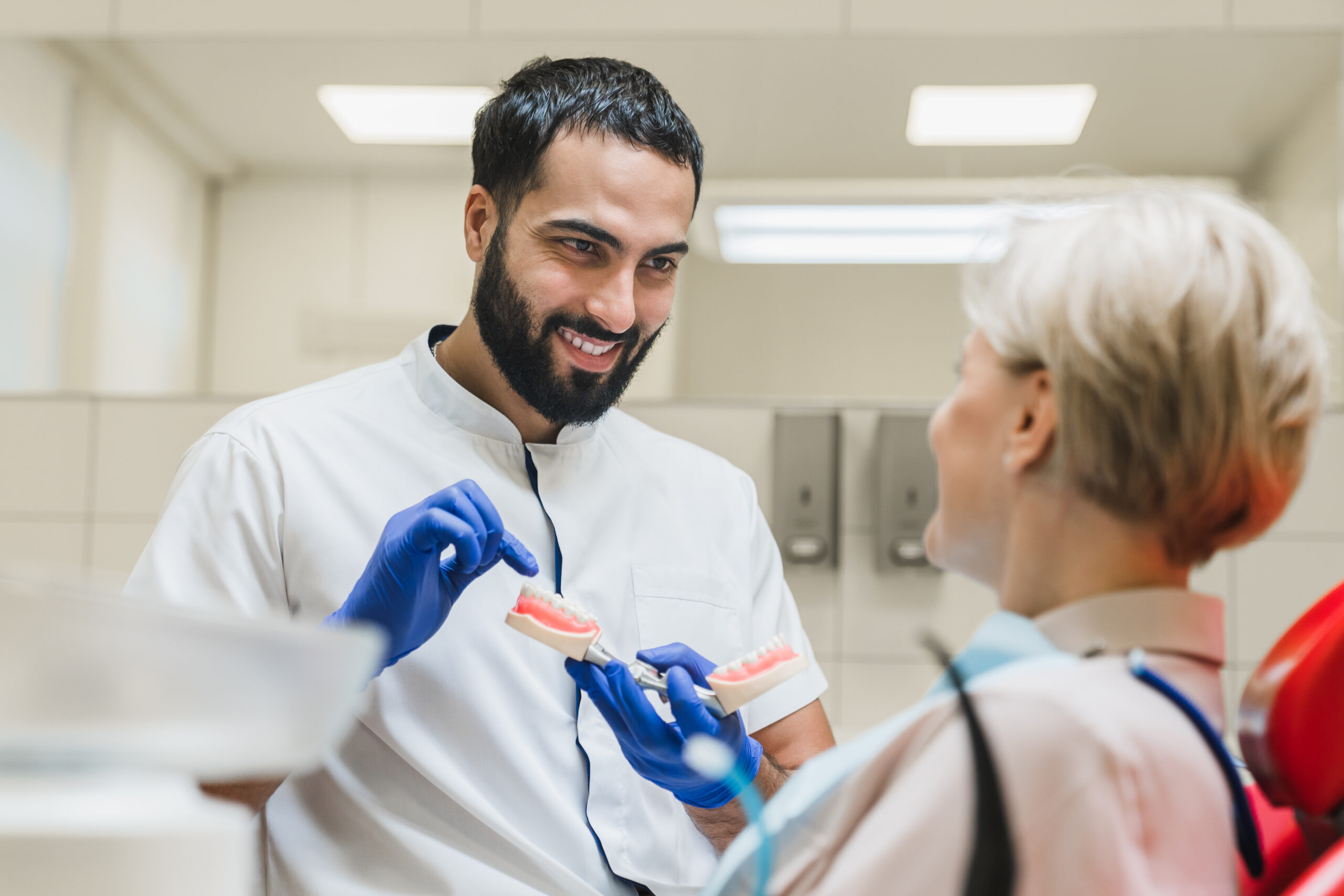 A dentist explaining if milk is good for teeth.